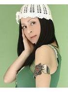 高胜美图片 个人资料,华语乐坛天后，歌声飘渺的美丽传奇